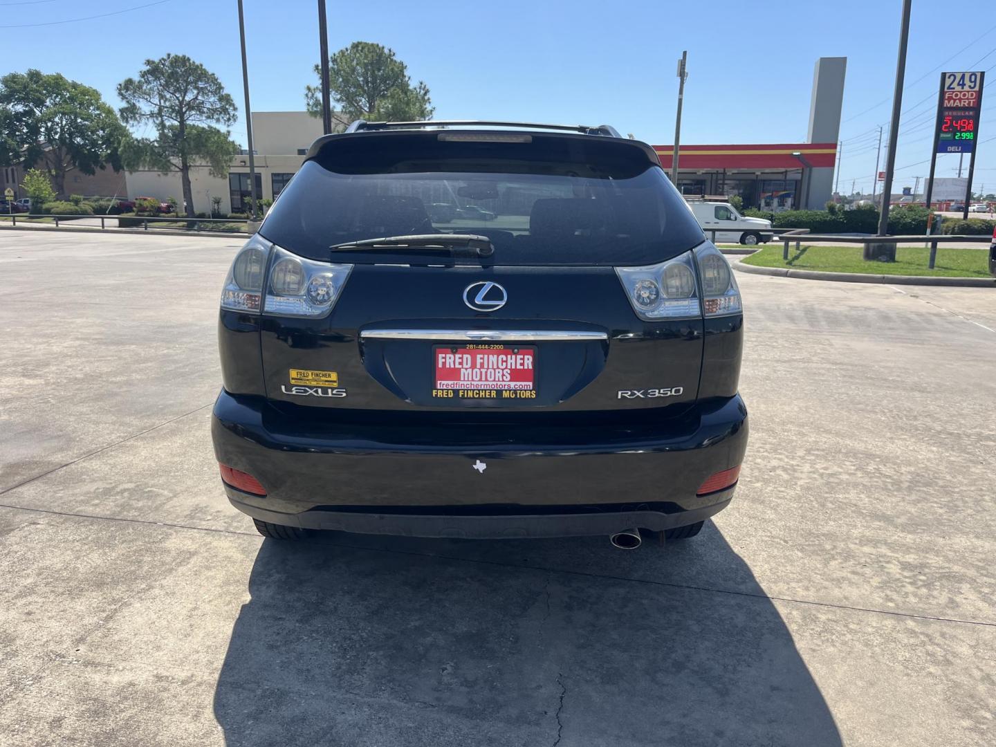 2007 black /gray Lexus RX 350 FWD (2T2GK31U27C) with an 3.5L V6 DOHC 24V engine, 5-Speed Automatic Overdrive transmission, located at 14700 Tomball Parkway 249, Houston, TX, 77086, (281) 444-2200, 29.928619, -95.504074 - Photo#5