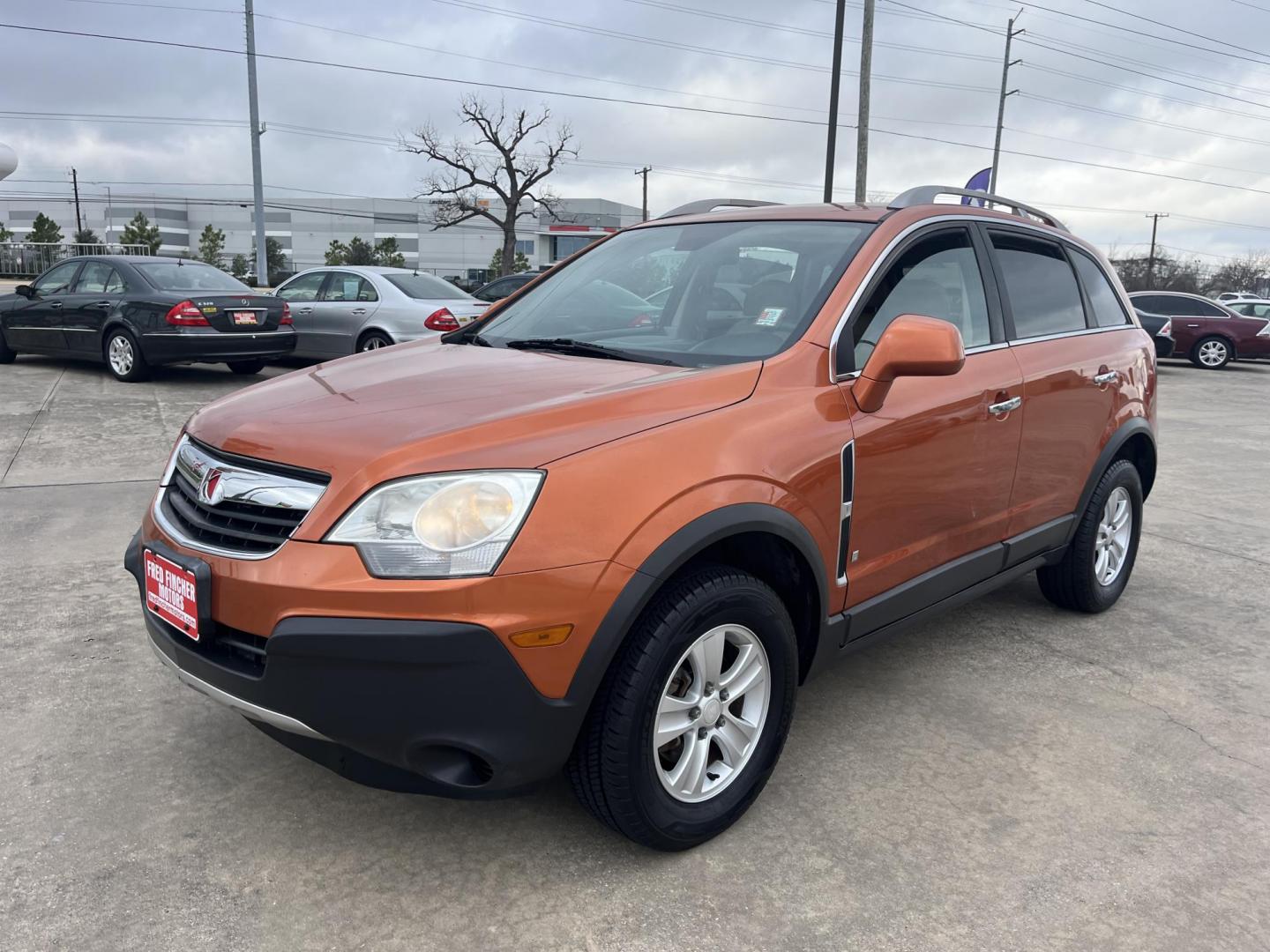 2008 orange /gray Saturn VUE FWD 4-Cylinder XE (3GSCL33P08S) with an 2.4L L4 DOHC 16V engine, 4-Speed Automatic Overdrive transmission, located at 14700 Tomball Parkway 249, Houston, TX, 77086, (281) 444-2200, 29.928619, -95.504074 - Photo#2