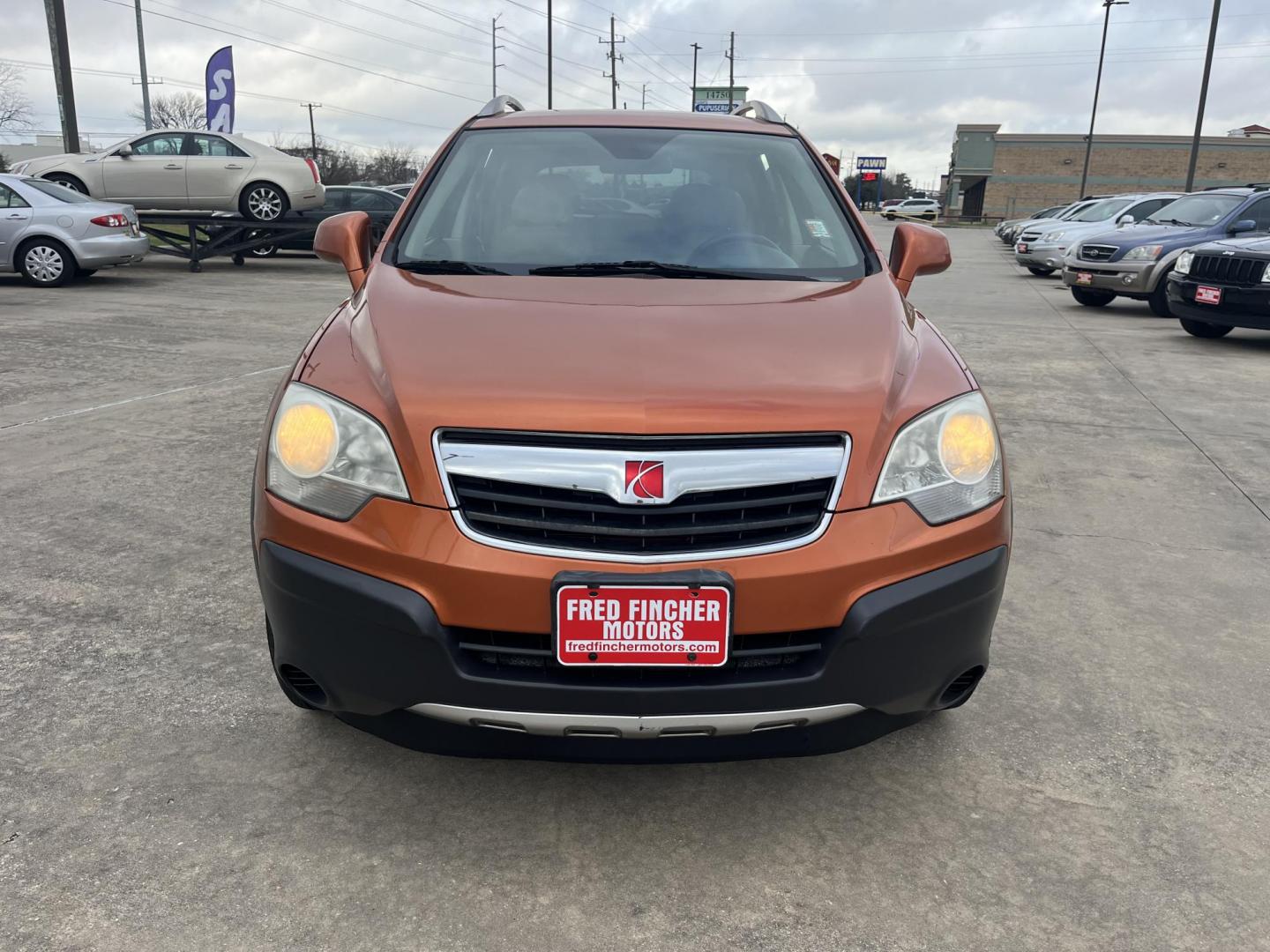 2008 orange /gray Saturn VUE FWD 4-Cylinder XE (3GSCL33P08S) with an 2.4L L4 DOHC 16V engine, 4-Speed Automatic Overdrive transmission, located at 14700 Tomball Parkway 249, Houston, TX, 77086, (281) 444-2200, 29.928619, -95.504074 - Photo#1