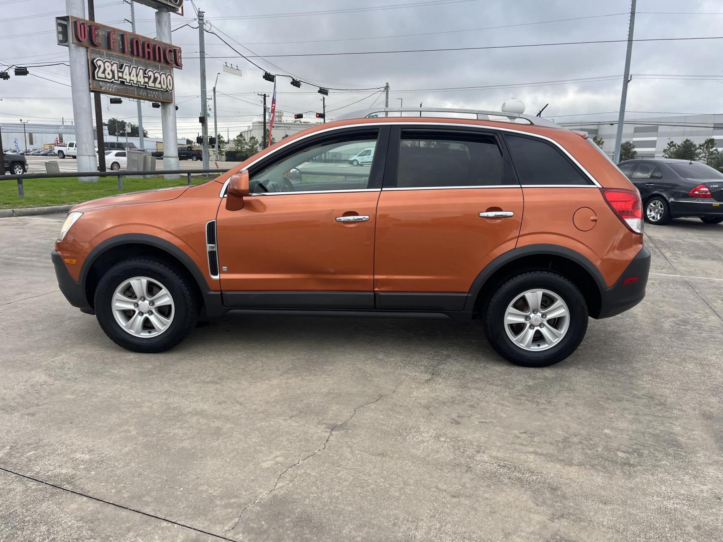 2008 orange /gray Saturn VUE FWD 4-Cylinder XE (3GSCL33P08S) with an 2.4L L4 DOHC 16V engine, 4-Speed Automatic Overdrive transmission, located at 14700 Tomball Parkway 249, Houston, TX, 77086, (281) 444-2200, 29.928619, -95.504074 - Photo#3