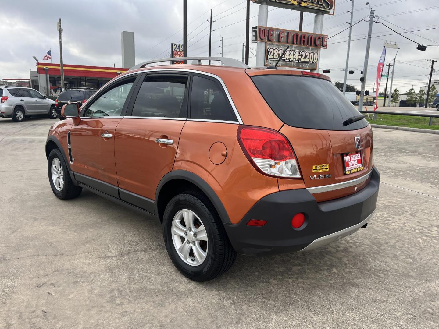 2008 orange /gray Saturn VUE FWD 4-Cylinder XE (3GSCL33P08S) with an 2.4L L4 DOHC 16V engine, 4-Speed Automatic Overdrive transmission, located at 14700 Tomball Parkway 249, Houston, TX, 77086, (281) 444-2200, 29.928619, -95.504074 - Photo#5