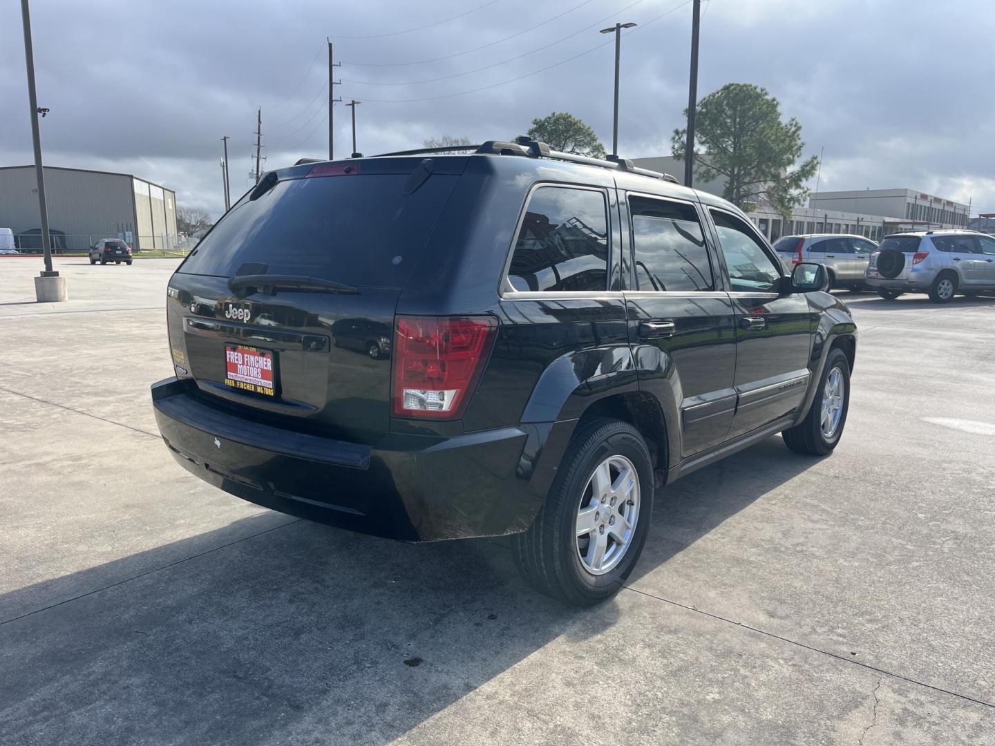 2006 black /black Jeep Grand Cherokee Laredo 2WD (1J4HS48N56C) with an 4.7L V8 SOHC 16V engine, 5-Speed Automatic Overdrive transmission, located at 14700 Tomball Parkway 249, Houston, TX, 77086, (281) 444-2200, 29.928619, -95.504074 - Photo#5