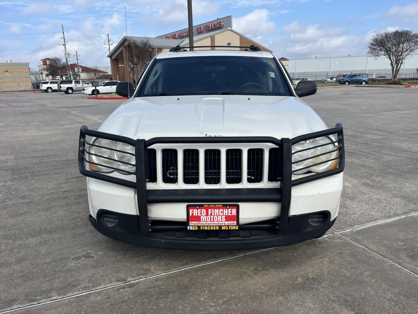 2009 white /gray5 Jeep Grand Cherokee Laredo 2WD (1J8GS48K39C) with an 3.7L V6 SOHC 12V engine, 5-Speed Automatic transmission, located at 14700 Tomball Parkway 249, Houston, TX, 77086, (281) 444-2200, 29.928619, -95.504074 - Photo#1
