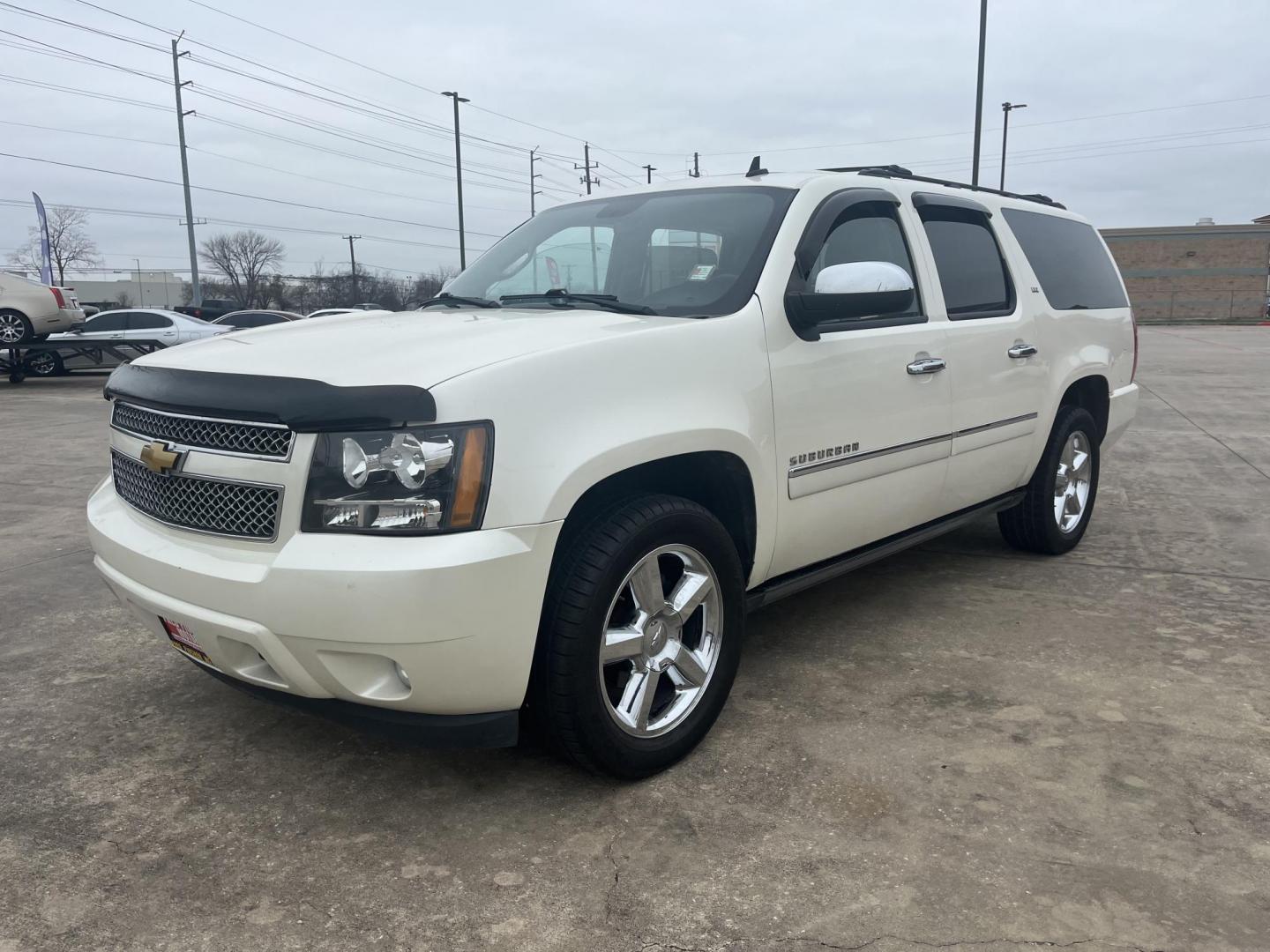 2011 white /black Chevrolet Suburban LTZ 1500 4WD (1GNSKKE37BR) with an 5.3L V8 OHV 16V FFV engine, 4-Speed Automatic transmission, located at 14700 Tomball Parkway 249, Houston, TX, 77086, (281) 444-2200, 29.928619, -95.504074 - Photo#2