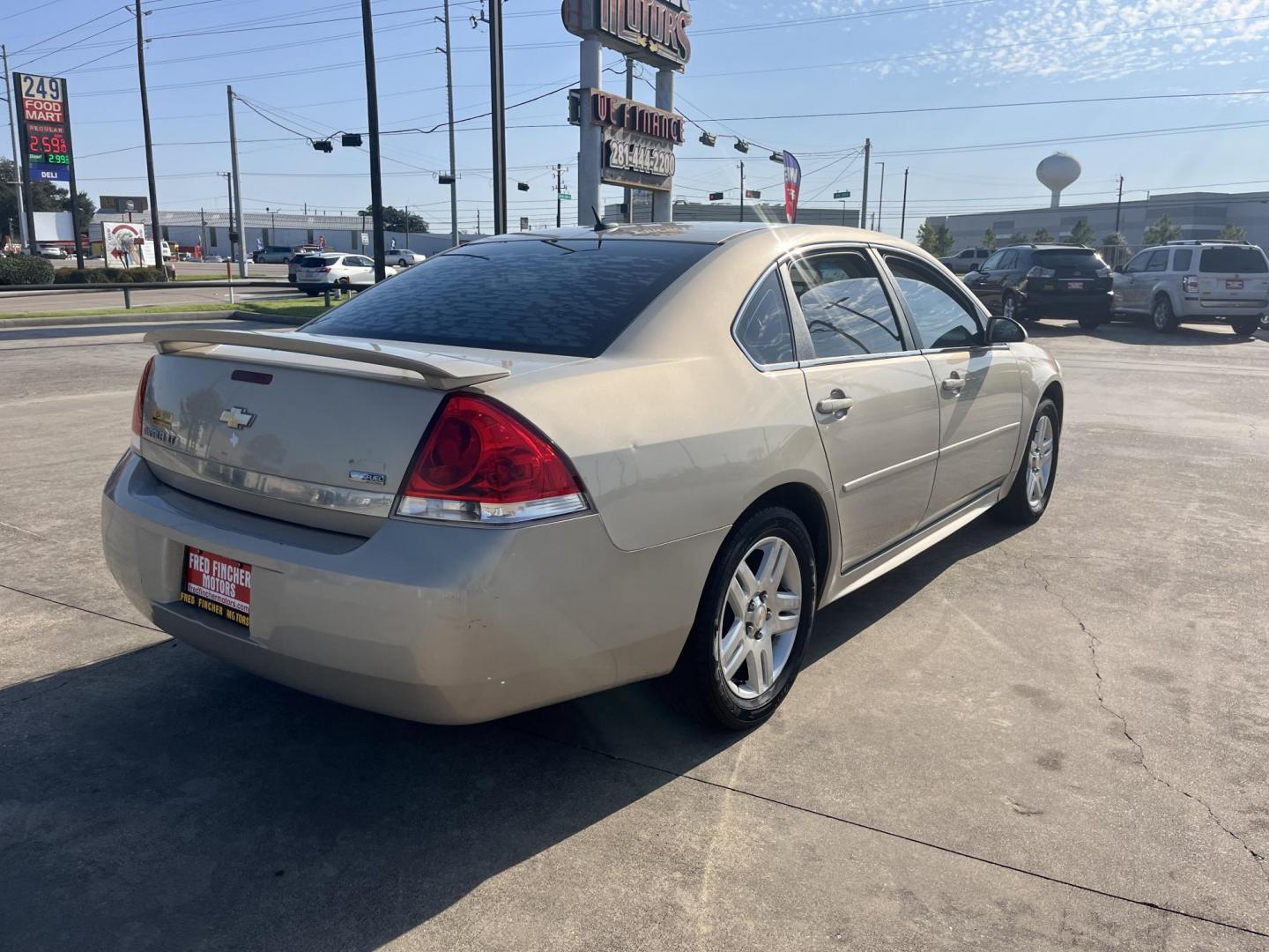 2010 GOLD /TAN Chevrolet Impala LT (2G1WB5EK9A1) with an 3.5L V6 OHV 12V FFV engine, 4-Speed Automatic transmission, located at 14700 Tomball Parkway 249, Houston, TX, 77086, (281) 444-2200, 29.928619, -95.504074 - Photo#6