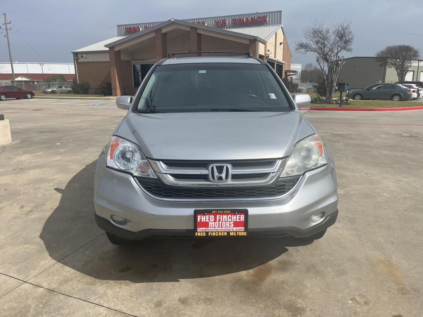 2011 silver /black Honda CR-V EX-L 2WD 5-Speed AT (5J6RE3H70BL) with an 2.4L L4 DOHC 16V engine, 5-Speed Automatic transmission, located at 14700 Tomball Parkway 249, Houston, TX, 77086, (281) 444-2200, 29.928619, -95.504074 - Photo#1