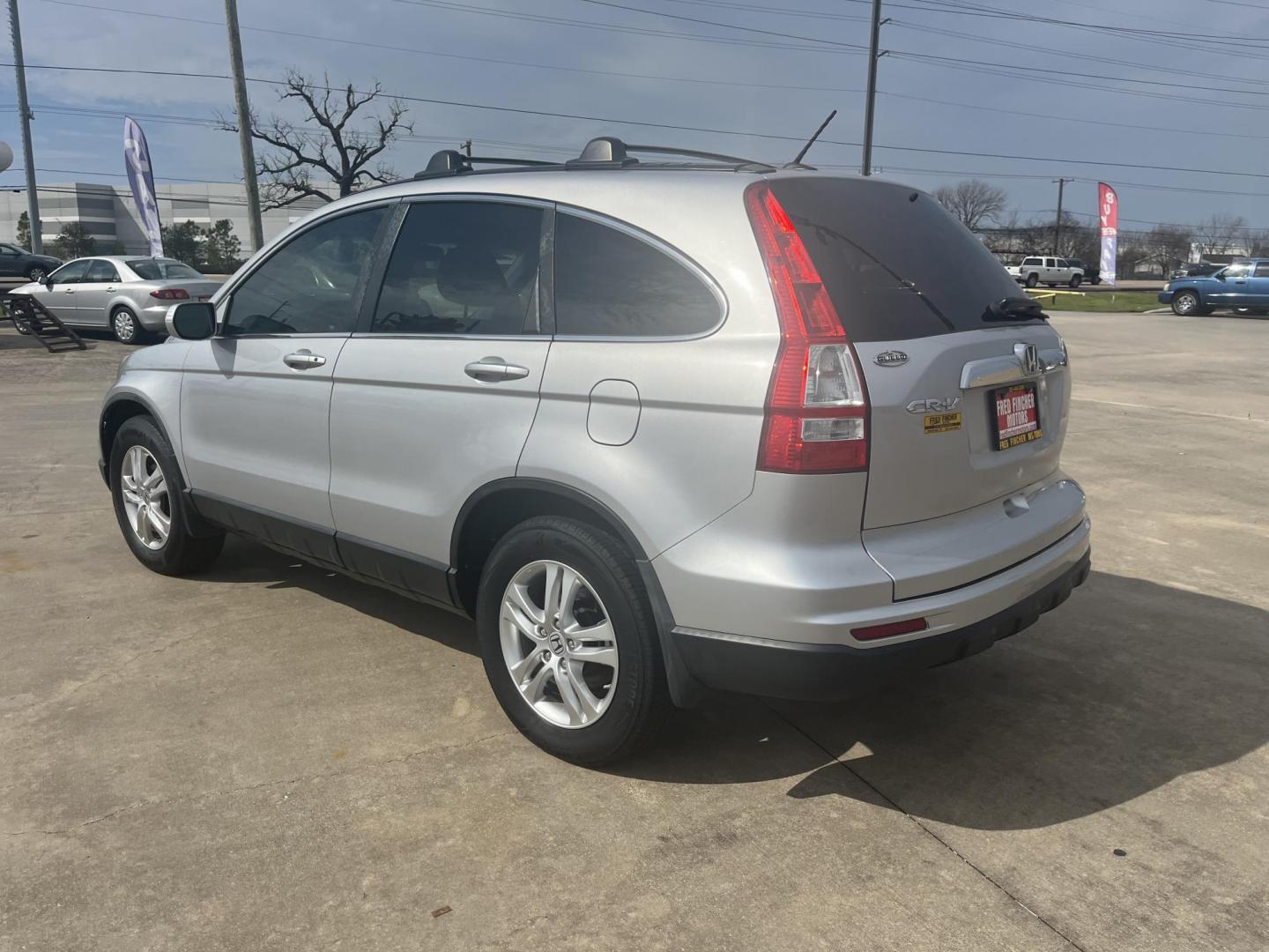 2011 silver /black Honda CR-V EX-L 2WD 5-Speed AT (5J6RE3H70BL) with an 2.4L L4 DOHC 16V engine, 5-Speed Automatic transmission, located at 14700 Tomball Parkway 249, Houston, TX, 77086, (281) 444-2200, 29.928619, -95.504074 - Photo#5