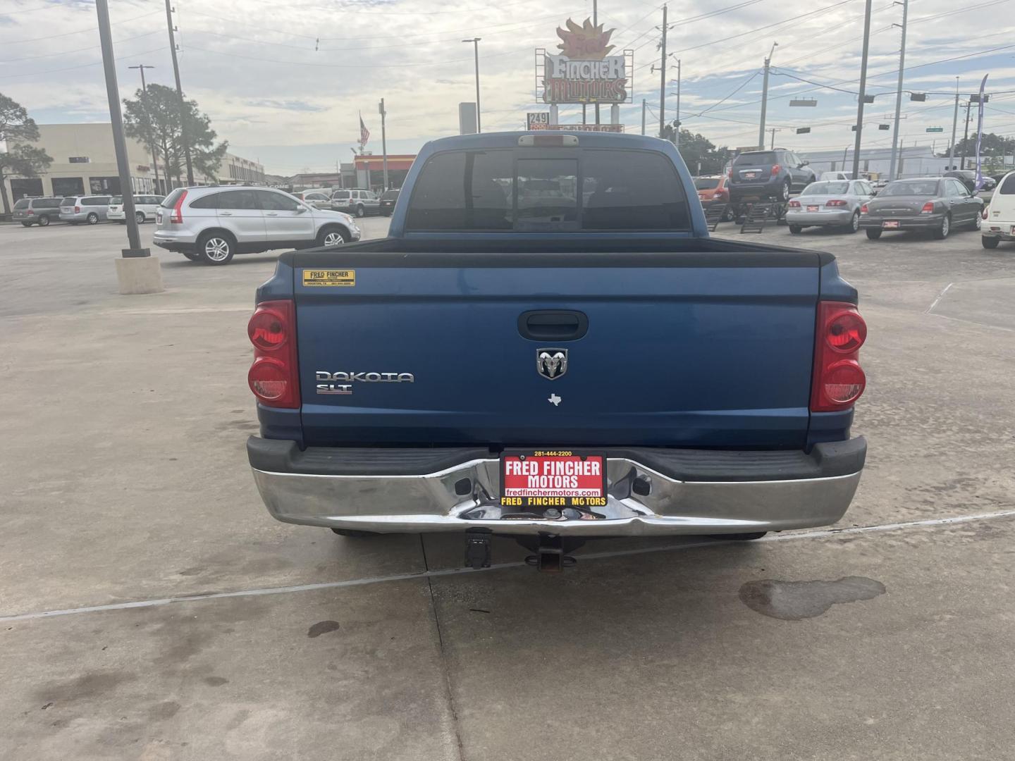 2006 blue /black Dodge Dakota SLT Quad Cab 4WD (1D7HW48K16S) with an 3.7L V6 SOHC 12V engine, Automatic Overdrive transmission, located at 14700 Tomball Parkway 249, Houston, TX, 77086, (281) 444-2200, 29.928619, -95.504074 - Photo#3