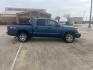 2006 blue /black Dodge Dakota SLT Quad Cab 4WD (1D7HW48K16S) with an 3.7L V6 SOHC 12V engine, Automatic Overdrive transmission, located at 14700 Tomball Parkway 249, Houston, TX, 77086, (281) 444-2200, 29.928619, -95.504074 - Photo#7