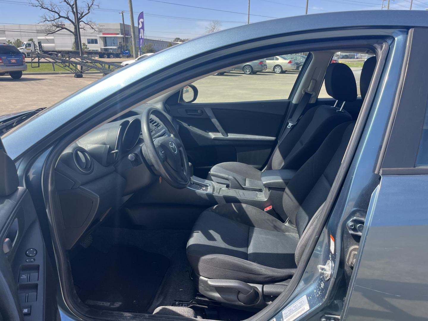 2010 blue /black Mazda MAZDA3 Unknown (JM1BL1SF1A1) , Automatic Overdrive transmission, located at 14700 Tomball Parkway 249, Houston, TX, 77086, (281) 444-2200, 29.928619, -95.504074 - Photo#9