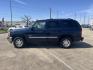 2006 blue /TAN GMC Yukon SL 4WD (1GKEK13Z76R) with an 5.3L V8 OHV 16V FFV engine, 4-Speed Automatic Overdrive transmission, located at 14700 Tomball Parkway 249, Houston, TX, 77086, (281) 444-2200, 29.928619, -95.504074 - Photo#2