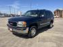2006 blue /TAN GMC Yukon SL 4WD (1GKEK13Z76R) with an 5.3L V8 OHV 16V FFV engine, 4-Speed Automatic Overdrive transmission, located at 14700 Tomball Parkway 249, Houston, TX, 77086, (281) 444-2200, 29.928619, -95.504074 - Photo#5