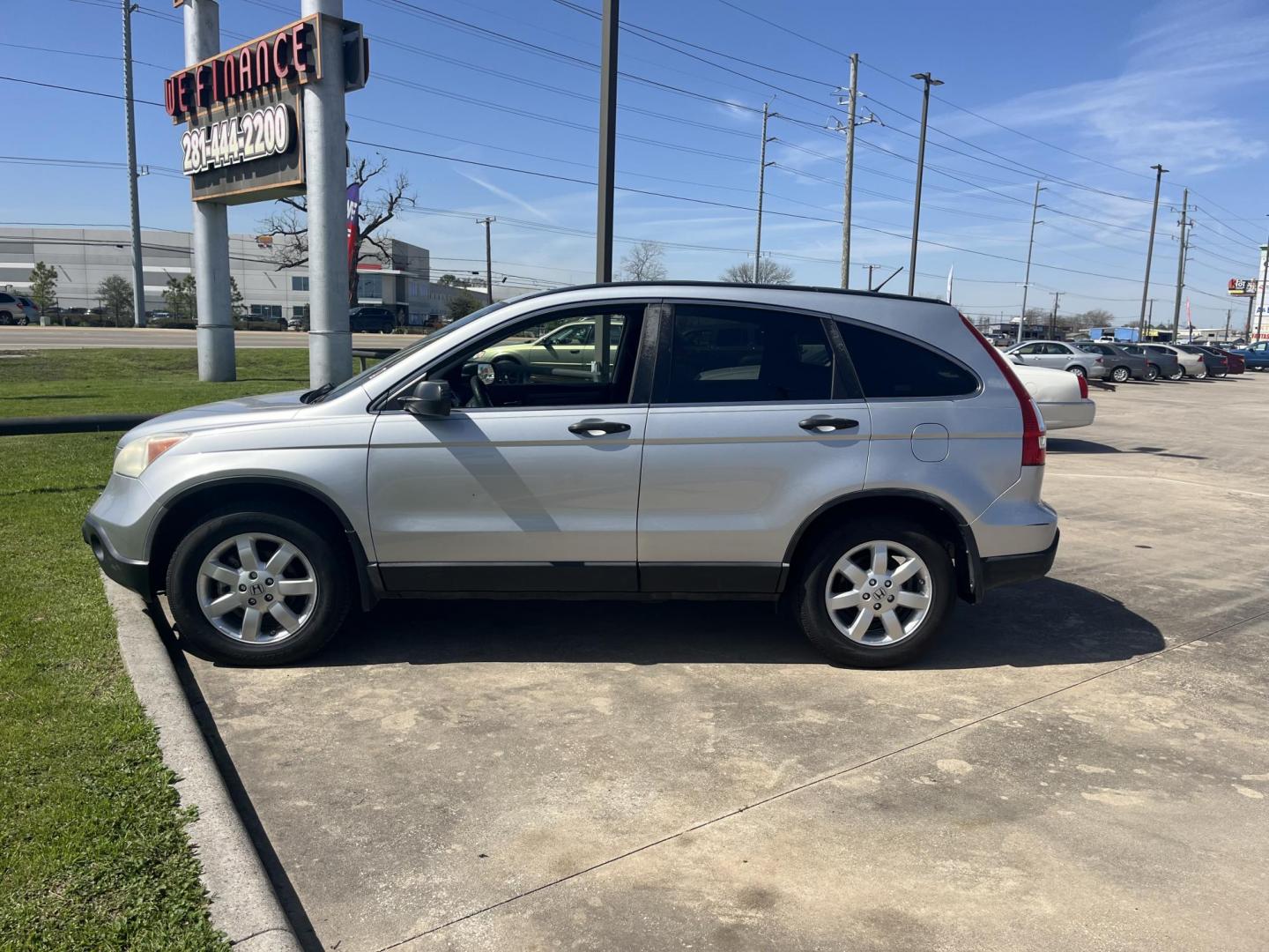 2009 silver /black Honda CR-V EX 2WD 5-Speed AT (3CZRE38559G) with an 2.4L L4 DOHC 16V engine, 5-Speed Automatic transmission, located at 14700 Tomball Parkway 249, Houston, TX, 77086, (281) 444-2200, 29.928619, -95.504074 - Photo#2