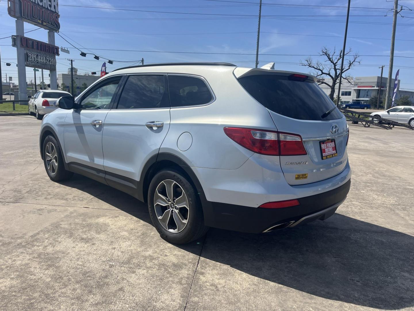 2013 silver /gray Hyundai Santa Fe GLS AWD (KM8SNDHF0DU) with an 3.3L V6 DOHC 24V engine, 6-Speed Automatic transmission, located at 14700 Tomball Parkway 249, Houston, TX, 77086, (281) 444-2200, 29.928619, -95.504074 - Photo#4