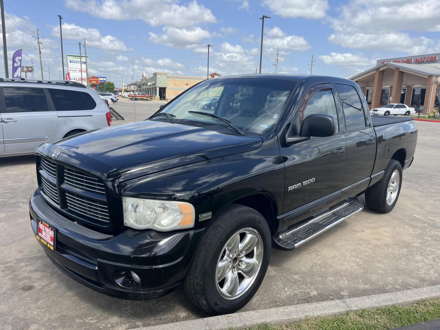 2005 black /black Dodge Ram 1500 Laramie Quad Cab Long Bed 2WD (1D7HA18D55S) with an 5.7L V8 OHV 16V engine, 5-Speed Automatic Overdrive transmission, located at 14700 Tomball Parkway 249, Houston, TX, 77086, (281) 444-2200, 29.928619, -95.504074 - Photo#1