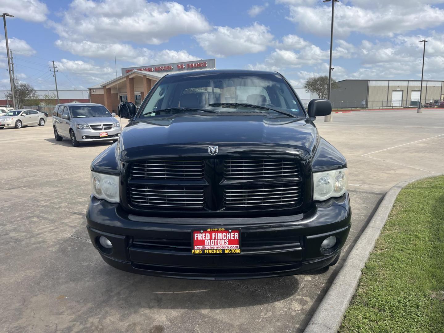 2005 black /black Dodge Ram 1500 Laramie Quad Cab Long Bed 2WD (1D7HA18D55S) with an 5.7L V8 OHV 16V engine, 5-Speed Automatic Overdrive transmission, located at 14700 Tomball Parkway 249, Houston, TX, 77086, (281) 444-2200, 29.928619, -95.504074 - Photo#2