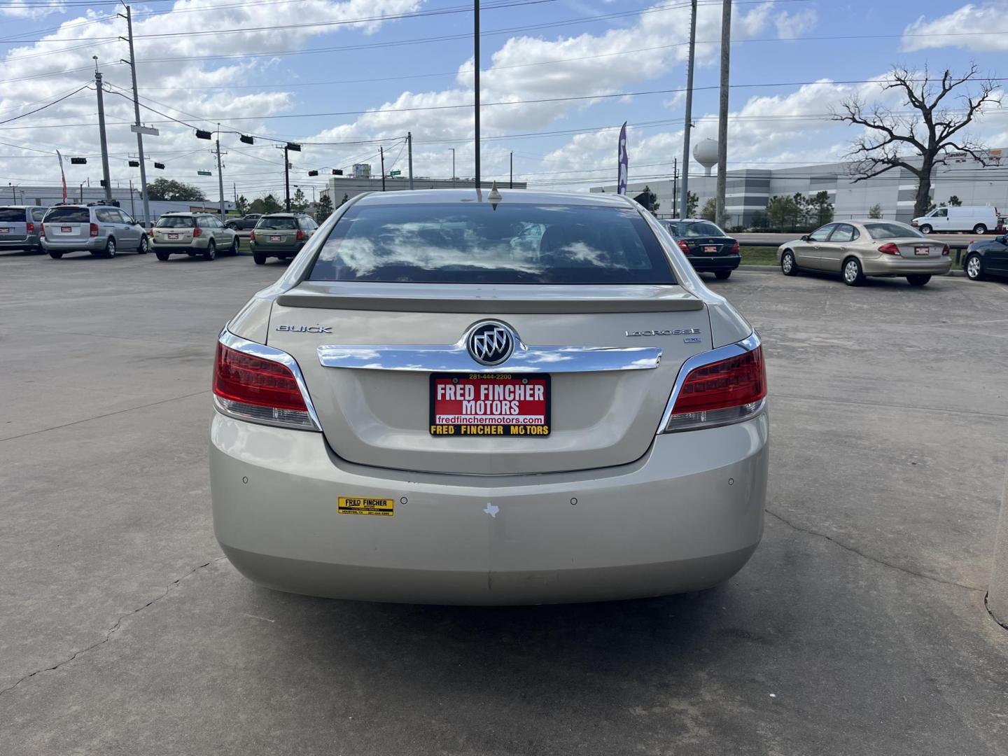 2011 GOLD /TAN Buick LaCrosse CXL FWD (1G4GC5EC9BF) with an 2.4L L4 DOHC 16V engine, 6-Speed Automatic Overdrive transmission, located at 14700 Tomball Parkway 249, Houston, TX, 77086, (281) 444-2200, 29.928619, -95.504074 - Photo#4