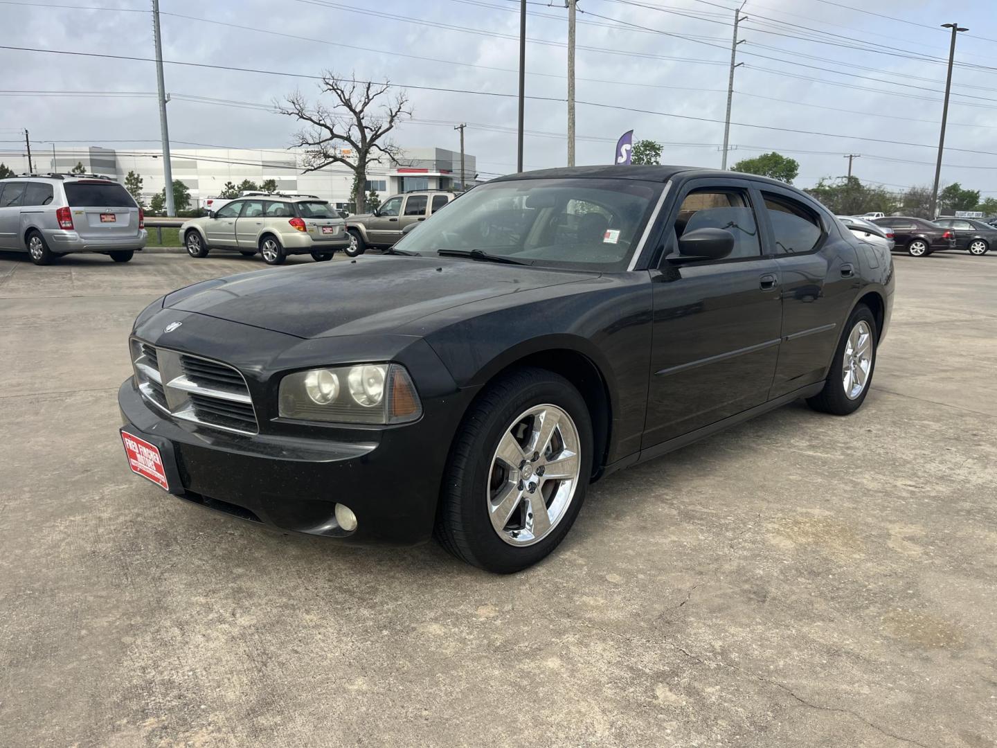 2007 black /black Dodge Charger SE (2B3KA43GX7H) with an 3.5L V6 SOHC 24V engine, 5-Speed Automatic Overdrive transmission, located at 14700 Tomball Parkway 249, Houston, TX, 77086, (281) 444-2200, 29.928619, -95.504074 - Photo#2