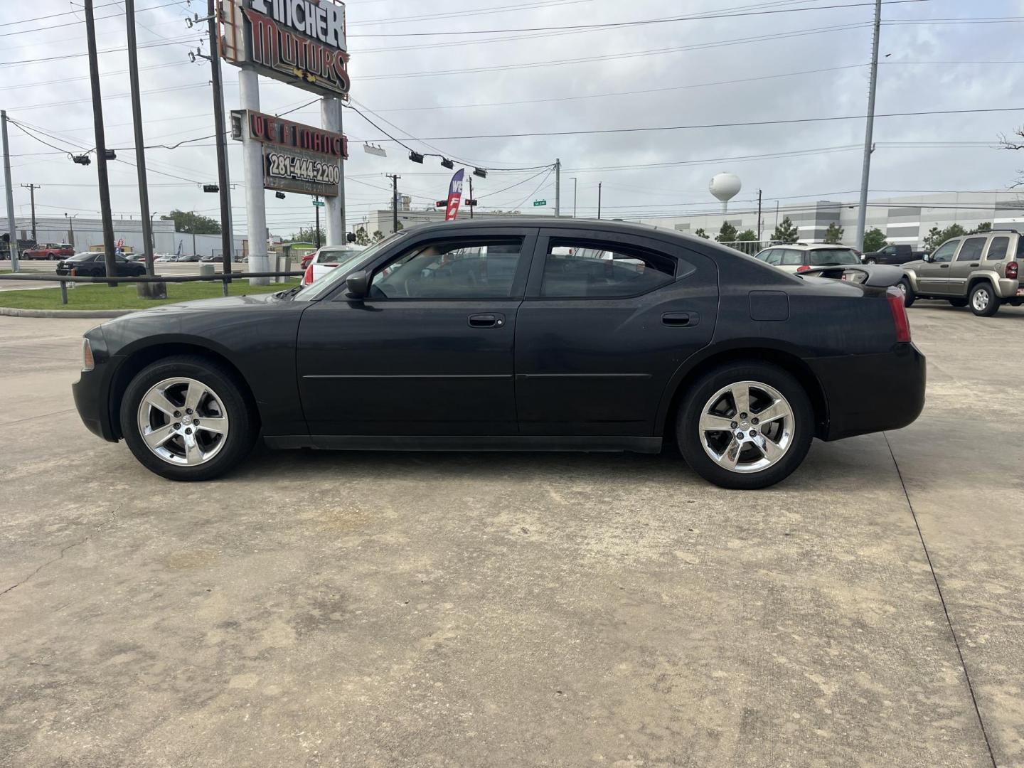 2007 black /black Dodge Charger SE (2B3KA43GX7H) with an 3.5L V6 SOHC 24V engine, 5-Speed Automatic Overdrive transmission, located at 14700 Tomball Parkway 249, Houston, TX, 77086, (281) 444-2200, 29.928619, -95.504074 - Photo#6