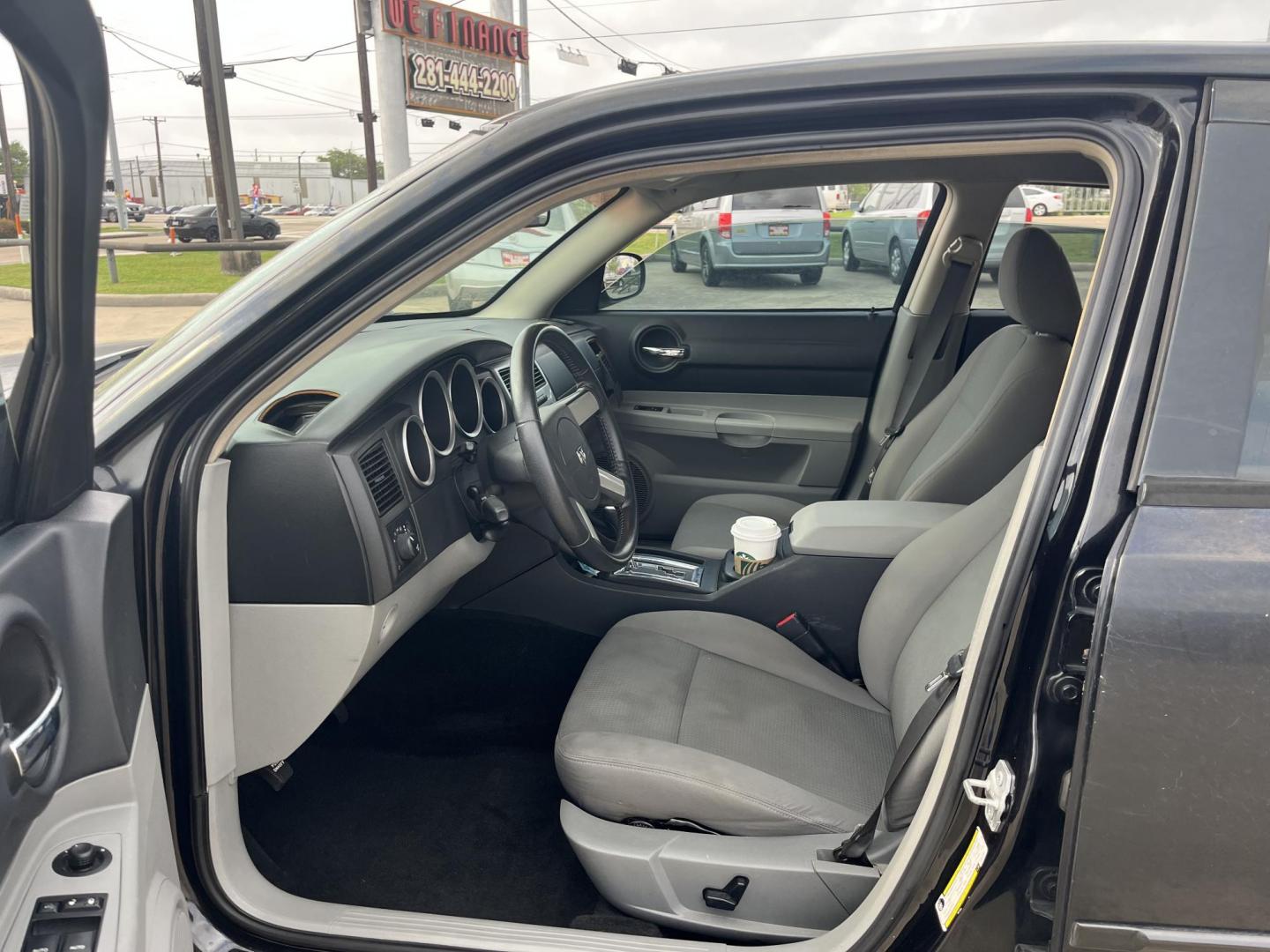 2007 black /black Dodge Charger SE (2B3KA43GX7H) with an 3.5L V6 SOHC 24V engine, 5-Speed Automatic Overdrive transmission, located at 14700 Tomball Parkway 249, Houston, TX, 77086, (281) 444-2200, 29.928619, -95.504074 - Photo#8
