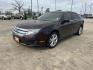 2012 purple /TAN Ford Fusion SE (3FAHP0HA5CR) with an 2.5L L4 DOHC 16V engine, Automatic Overdrive transmission, located at 14700 Tomball Parkway 249, Houston, TX, 77086, (281) 444-2200, 29.928619, -95.504074 - Photo#2