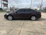 2012 purple /TAN Ford Fusion SE (3FAHP0HA5CR) with an 2.5L L4 DOHC 16V engine, Automatic Overdrive transmission, located at 14700 Tomball Parkway 249, Houston, TX, 77086, (281) 444-2200, 29.928619, -95.504074 - Photo#3