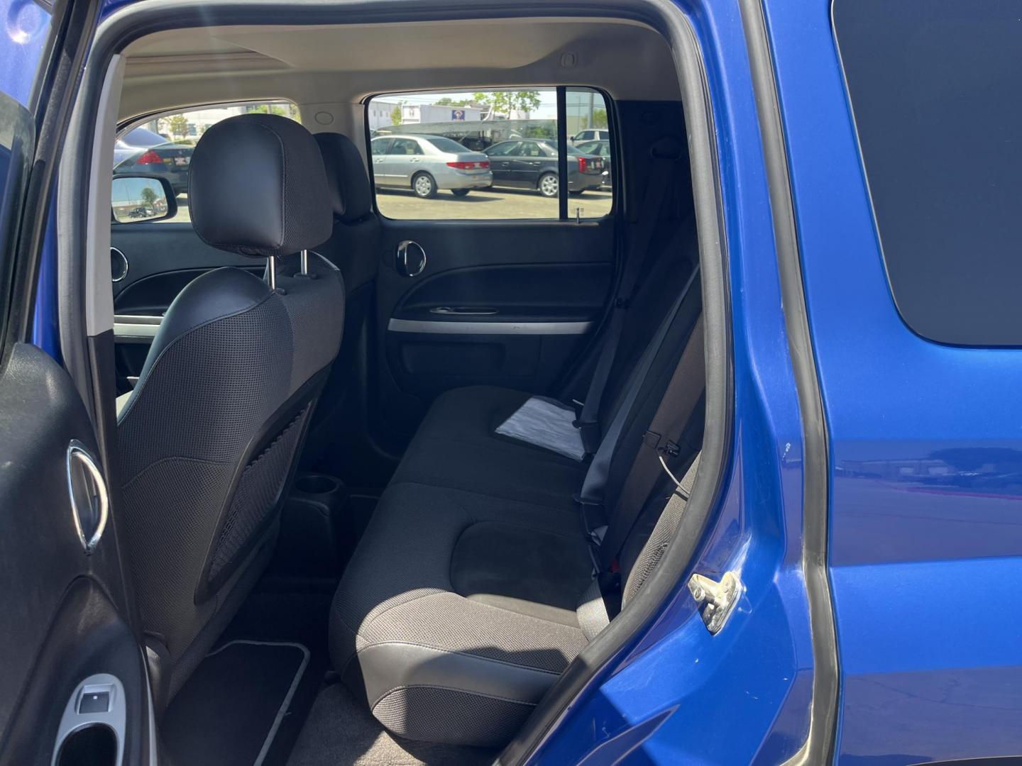 2008 blue /black Chevrolet HHR SS (3GNDA63XX8S) with an 2.0L L4 DOHC 16V SUPERCHARGER engine, 5-Speed Manual Overdrive transmission, located at 14700 Tomball Parkway 249, Houston, TX, 77086, (281) 444-2200, 29.928619, -95.504074 - Photo#9