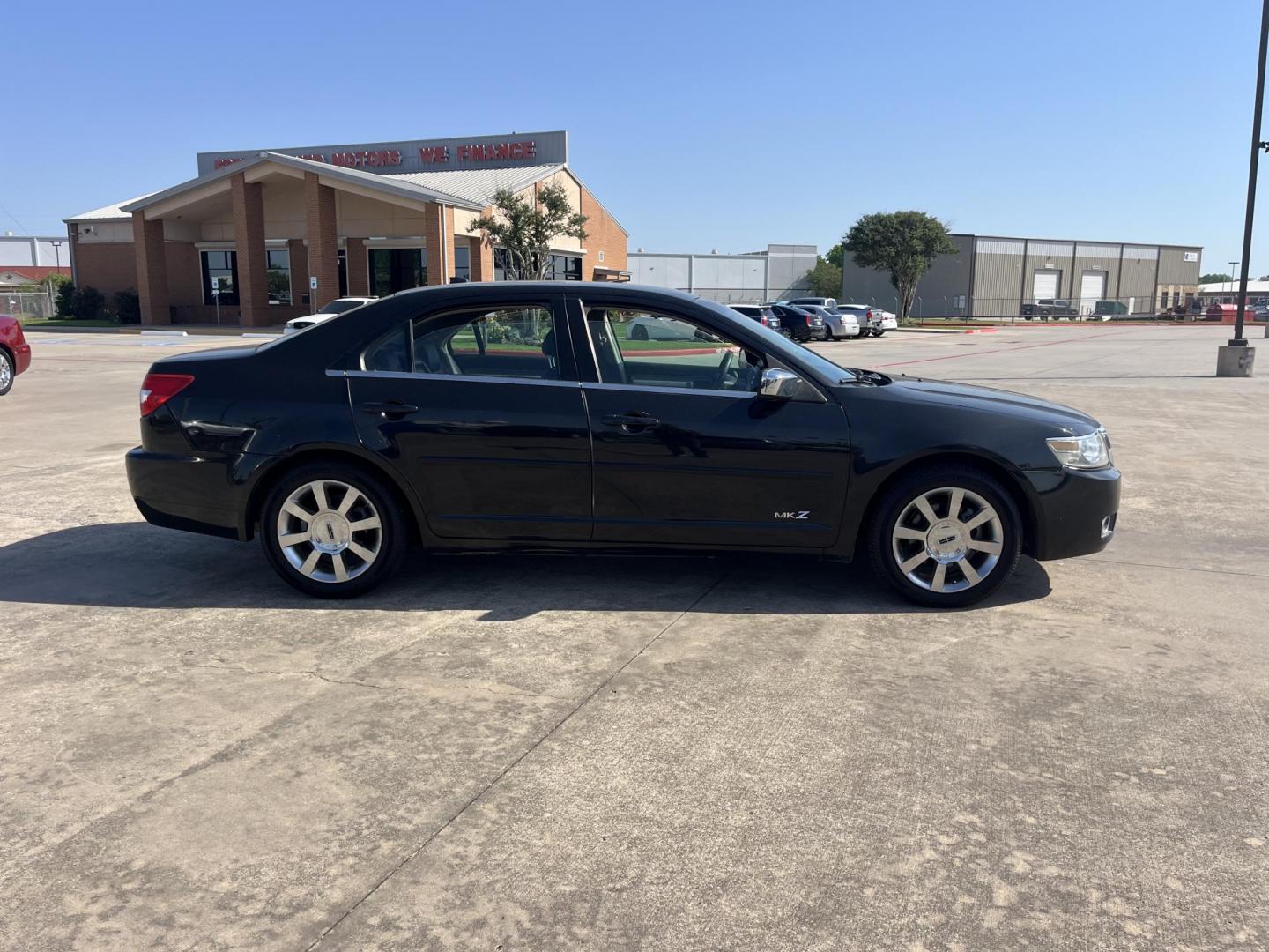 2009 black /black Lincoln MKZ FWD (3LNHM26T09R) with an 3.5L V6 DOHC 24V engine, 6-Speed Automatic transmission, located at 14700 Tomball Parkway 249, Houston, TX, 77086, (281) 444-2200, 29.928619, -95.504074 - Photo#6
