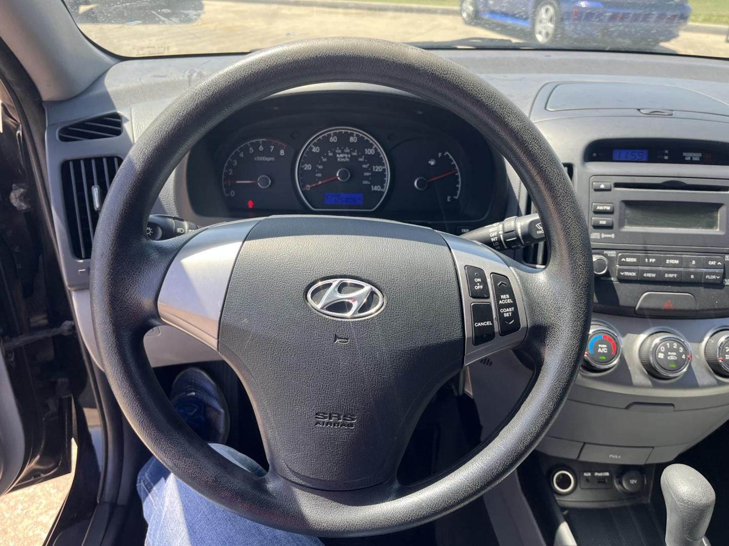 2010 black /gray Hyundai Elantra GLS (KMHDU4AD7AU) with an 2.0L L4 DOHC 16V engine, auto transmission, located at 14700 Tomball Parkway 249, Houston, TX, 77086, (281) 444-2200, 29.928619, -95.504074 - Photo#16