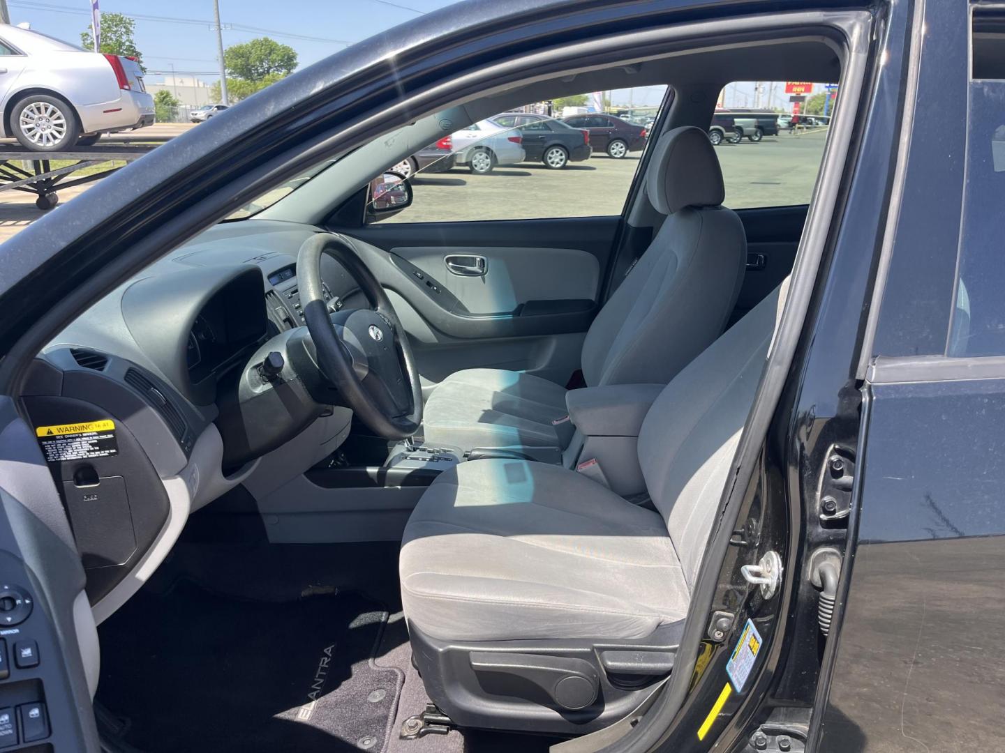 2010 black /gray Hyundai Elantra GLS (KMHDU4AD7AU) with an 2.0L L4 DOHC 16V engine, auto transmission, located at 14700 Tomball Parkway 249, Houston, TX, 77086, (281) 444-2200, 29.928619, -95.504074 - Photo#8