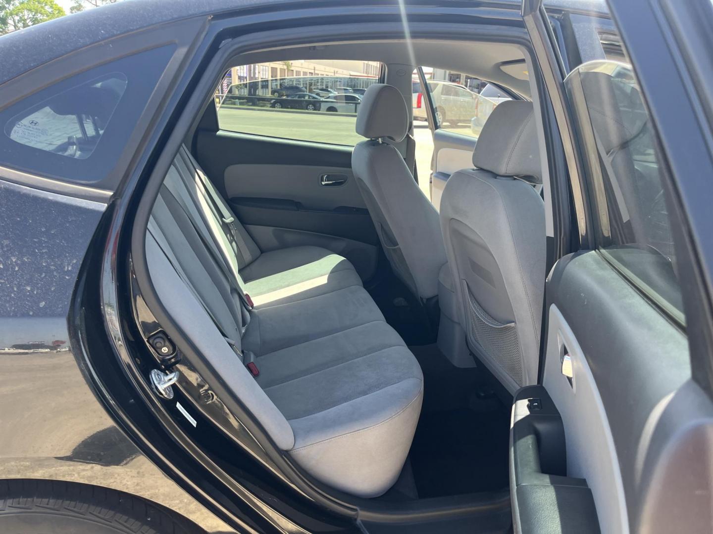 2010 black /gray Hyundai Elantra GLS (KMHDU4AD7AU) with an 2.0L L4 DOHC 16V engine, auto transmission, located at 14700 Tomball Parkway 249, Houston, TX, 77086, (281) 444-2200, 29.928619, -95.504074 - Photo#10