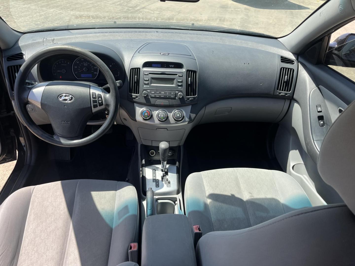 2010 black /gray Hyundai Elantra GLS (KMHDU4AD7AU) with an 2.0L L4 DOHC 16V engine, auto transmission, located at 14700 Tomball Parkway 249, Houston, TX, 77086, (281) 444-2200, 29.928619, -95.504074 - Photo#11