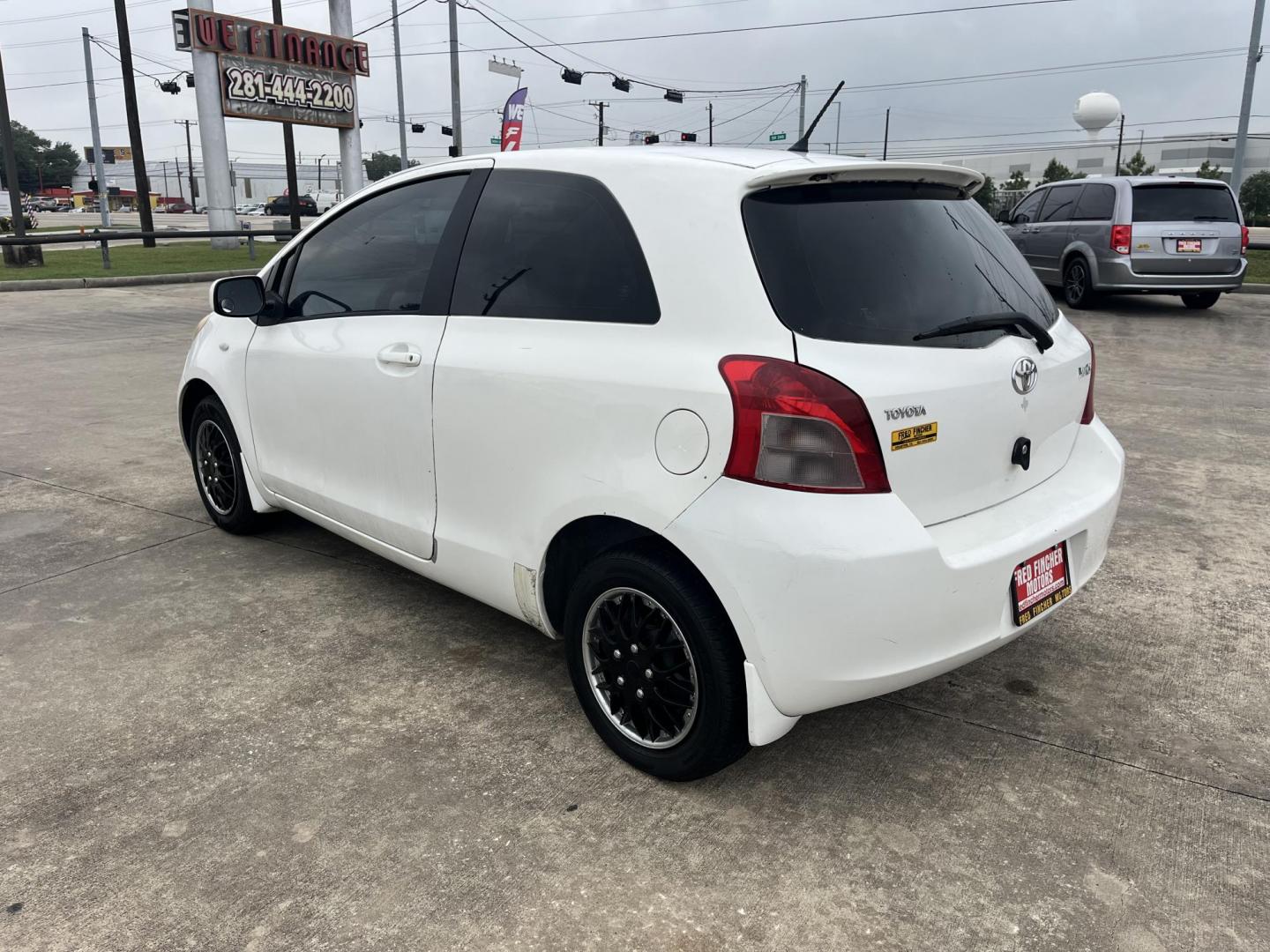 2006 white /Black Toyota Yaris 3-Door Liftback (JTDJT923665) with an 1.5L L4 DOHC 16V engine, Automatic transmission, located at 14700 Tomball Parkway 249, Houston, TX, 77086, (281) 444-2200, 29.928619, -95.504074 - Photo#6