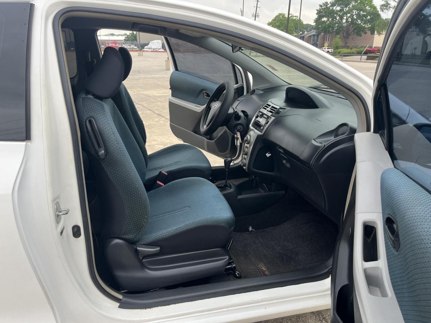 2006 white /Black Toyota Yaris 3-Door Liftback (JTDJT923665) with an 1.5L L4 DOHC 16V engine, Automatic transmission, located at 14700 Tomball Parkway 249, Houston, TX, 77086, (281) 444-2200, 29.928619, -95.504074 - Photo#11