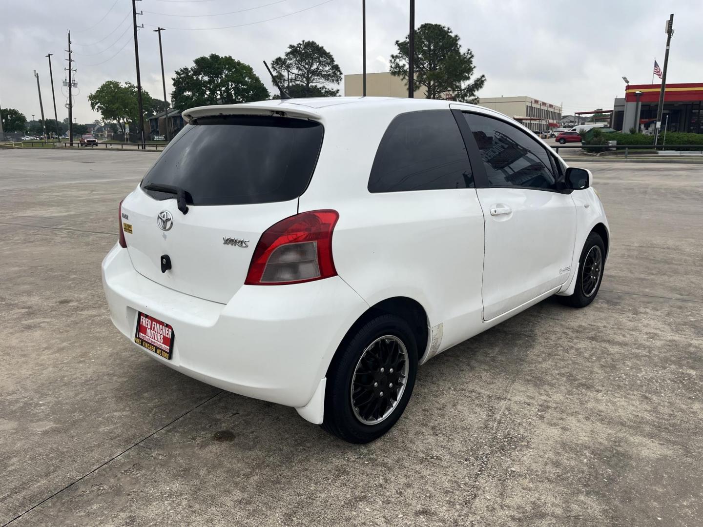 2006 white /Black Toyota Yaris 3-Door Liftback (JTDJT923665) with an 1.5L L4 DOHC 16V engine, Automatic transmission, located at 14700 Tomball Parkway 249, Houston, TX, 77086, (281) 444-2200, 29.928619, -95.504074 - Photo#4