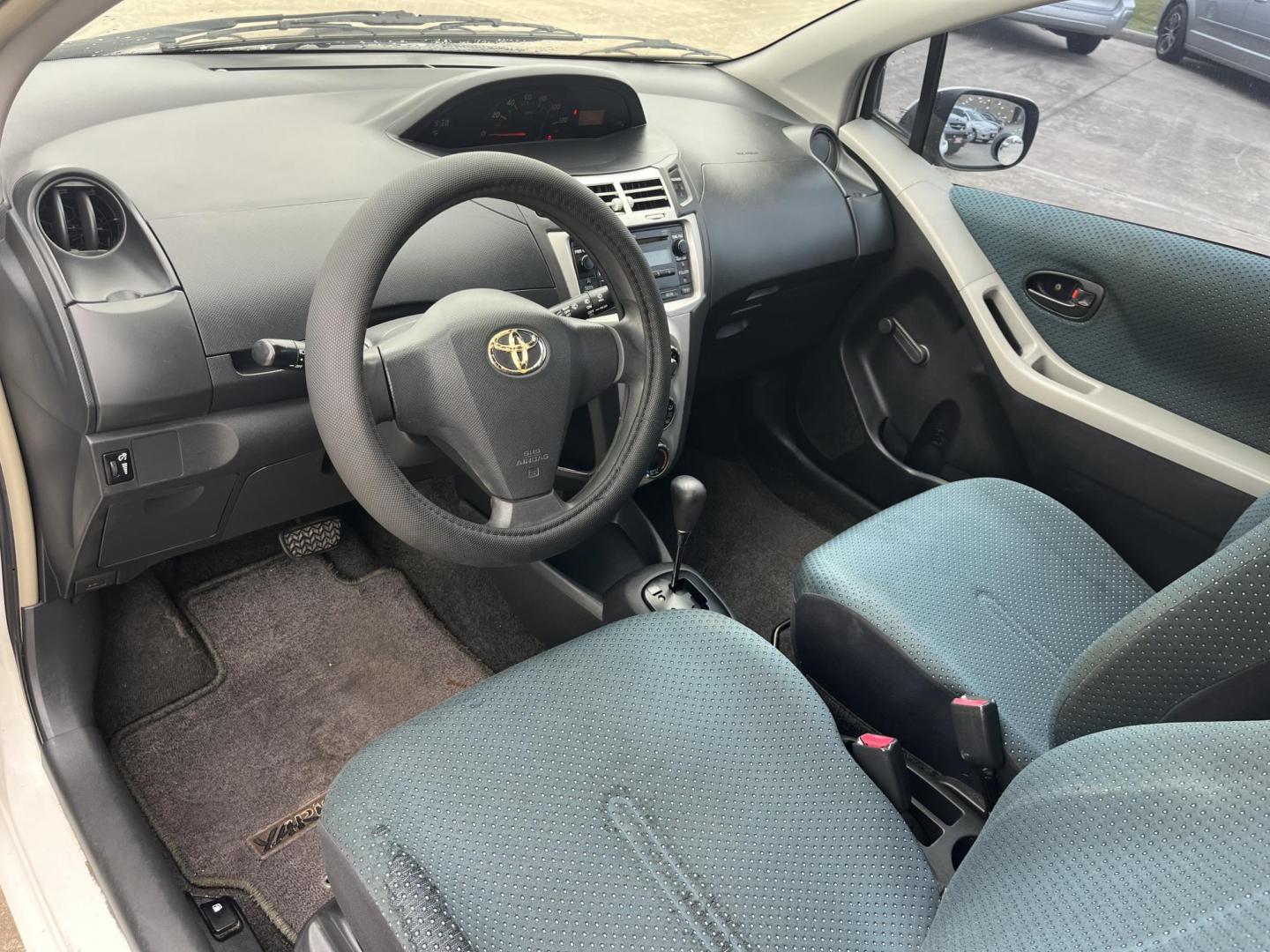2006 white /Black Toyota Yaris 3-Door Liftback (JTDJT923665) with an 1.5L L4 DOHC 16V engine, Automatic transmission, located at 14700 Tomball Parkway 249, Houston, TX, 77086, (281) 444-2200, 29.928619, -95.504074 - Photo#9