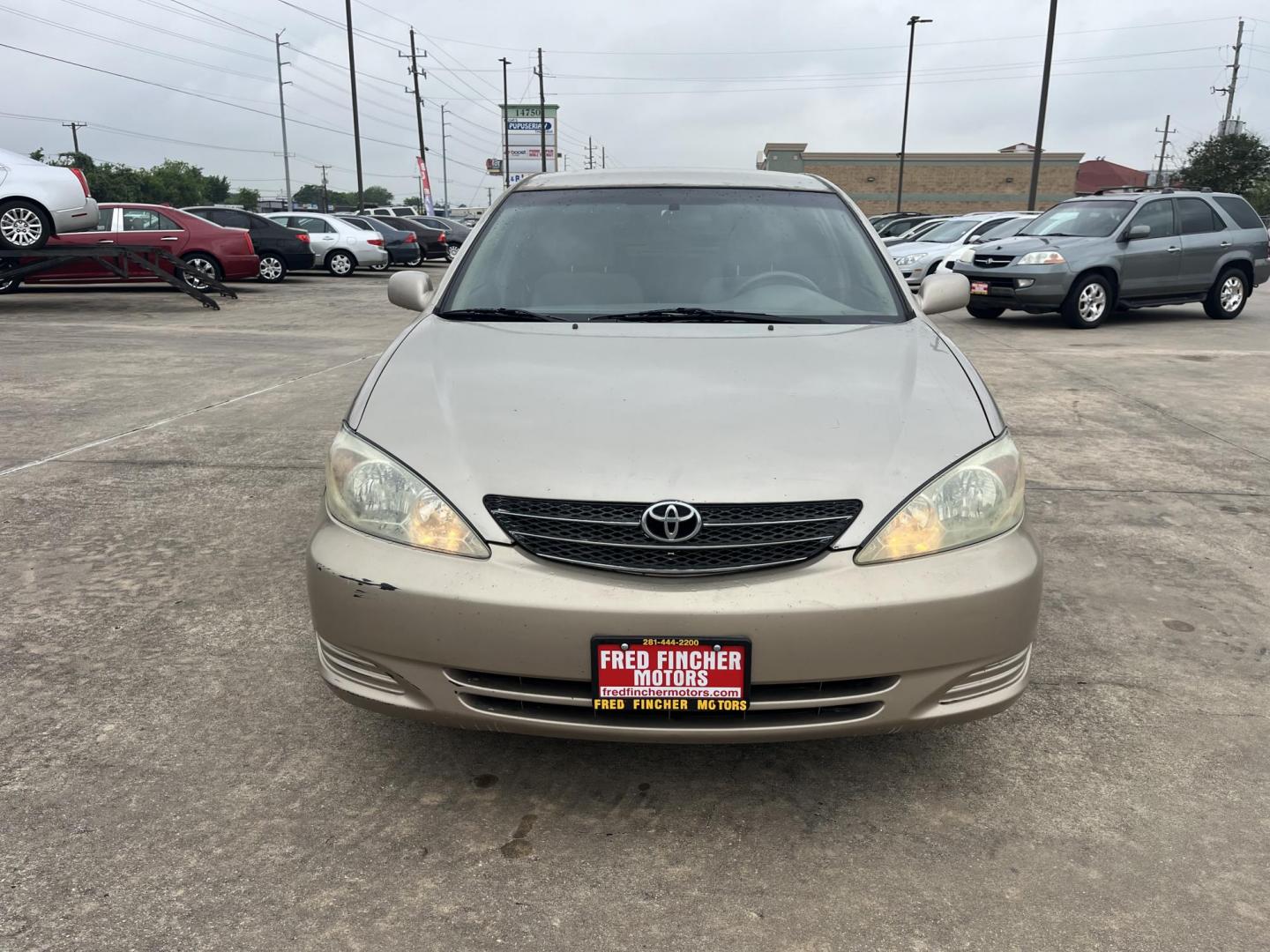 2004 GOLD /Tan Toyota Camry LE (4T1BE32K14U) with an 2.4L L4 DOHC 16V engine, Automatic transmission, located at 14700 Tomball Parkway 249, Houston, TX, 77086, (281) 444-2200, 29.928619, -95.504074 - Photo#1