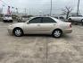 2004 GOLD /Tan Toyota Camry LE (4T1BE32K14U) with an 2.4L L4 DOHC 16V engine, Automatic transmission, located at 14700 Tomball Parkway 249, Houston, TX, 77086, (281) 444-2200, 29.928619, -95.504074 - Photo#2