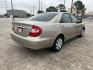 2004 GOLD /Tan Toyota Camry LE (4T1BE32K14U) with an 2.4L L4 DOHC 16V engine, Automatic transmission, located at 14700 Tomball Parkway 249, Houston, TX, 77086, (281) 444-2200, 29.928619, -95.504074 - Photo#5