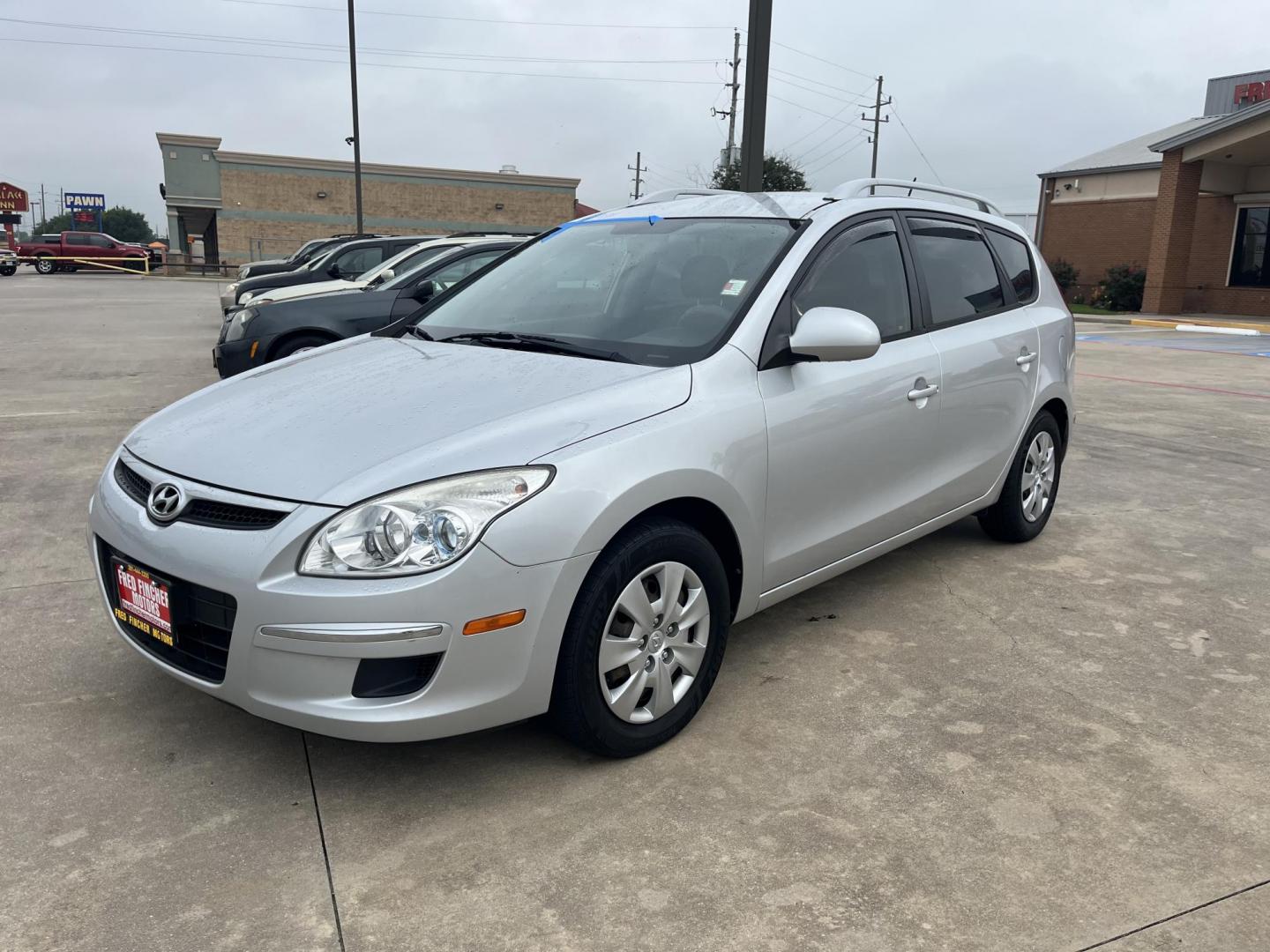 2011 silver /Black Hyundai Elantra Touring GLS Automatic (KMHDC8AE0BU) with an 2.0L L4 DOHC 16V engine, 4-Speed Automatic transmission, located at 14700 Tomball Parkway 249, Houston, TX, 77086, (281) 444-2200, 29.928619, -95.504074 - Photo#1