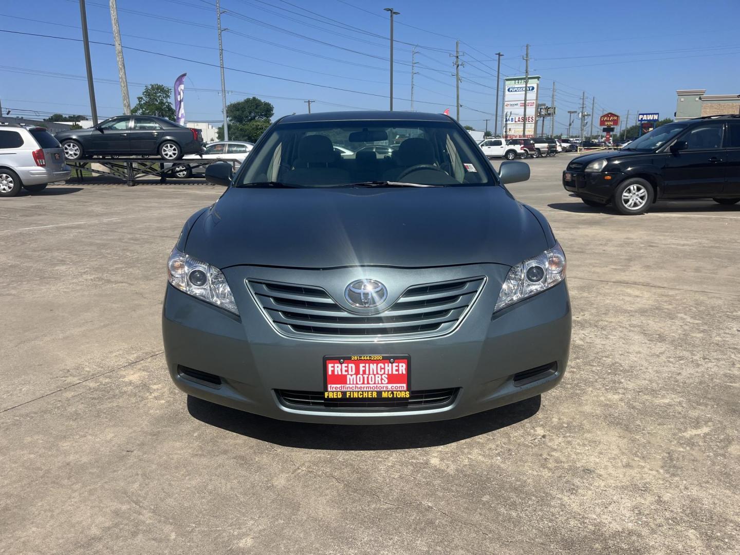 2007 Green /Gray Toyota Camry CE 5-Spd AT (4T1BE46K47U) with an 2.4L L4 DOHC 16V engine, 5-Speed Automatic Overdrive transmission, located at 14700 Tomball Parkway 249, Houston, TX, 77086, (281) 444-2200, 29.928619, -95.504074 - Photo#1