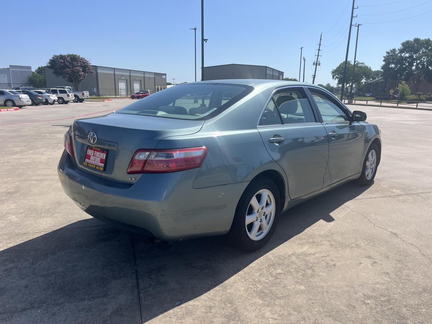 2007 Green /Gray Toyota Camry CE 5-Spd AT (4T1BE46K47U) with an 2.4L L4 DOHC 16V engine, 5-Speed Automatic Overdrive transmission, located at 14700 Tomball Parkway 249, Houston, TX, 77086, (281) 444-2200, 29.928619, -95.504074 - Photo#6