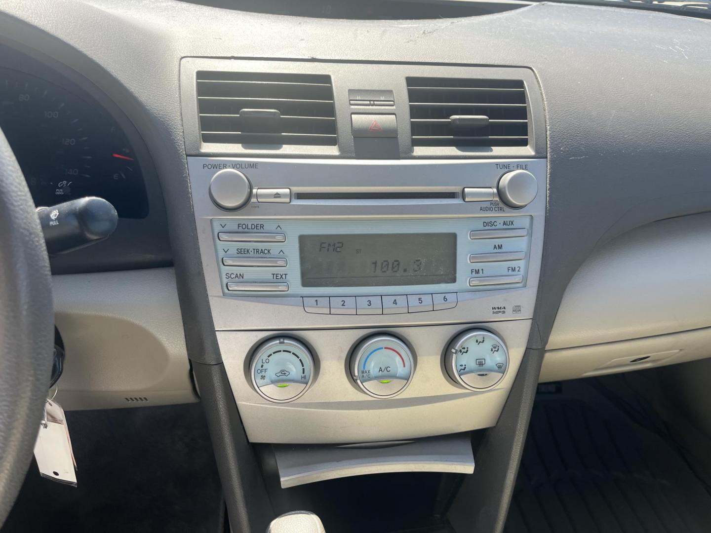 2007 Green /Gray Toyota Camry CE 5-Spd AT (4T1BE46K47U) with an 2.4L L4 DOHC 16V engine, 5-Speed Automatic Overdrive transmission, located at 14700 Tomball Parkway 249, Houston, TX, 77086, (281) 444-2200, 29.928619, -95.504074 - Photo#14