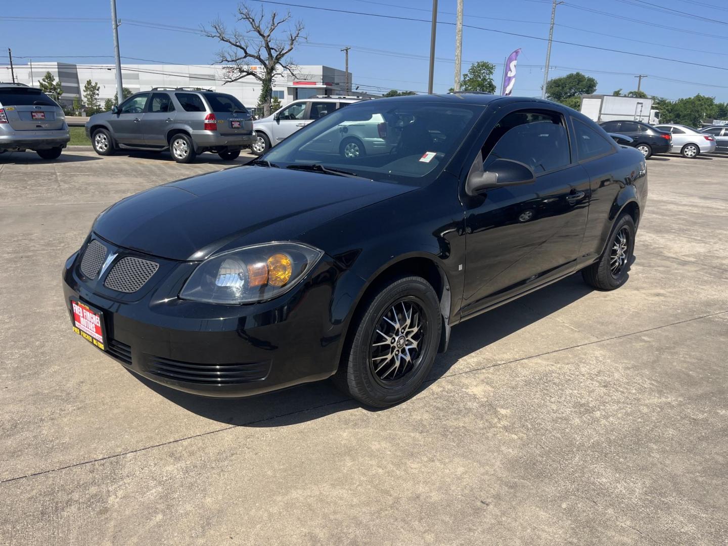 2009 black /Black Pontiac G5 Coupe (1G2AL18H097) with an 2.2L L4 DOHC 16V engine, 5-Speed Manual transmission, located at 14700 Tomball Parkway 249, Houston, TX, 77086, (281) 444-2200, 29.928619, -95.504074 - Photo#2