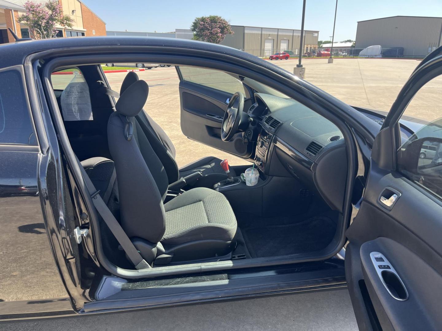 2009 black /Black Pontiac G5 Coupe (1G2AL18H097) with an 2.2L L4 DOHC 16V engine, 5-Speed Manual transmission, located at 14700 Tomball Parkway 249, Houston, TX, 77086, (281) 444-2200, 29.928619, -95.504074 - Photo#11