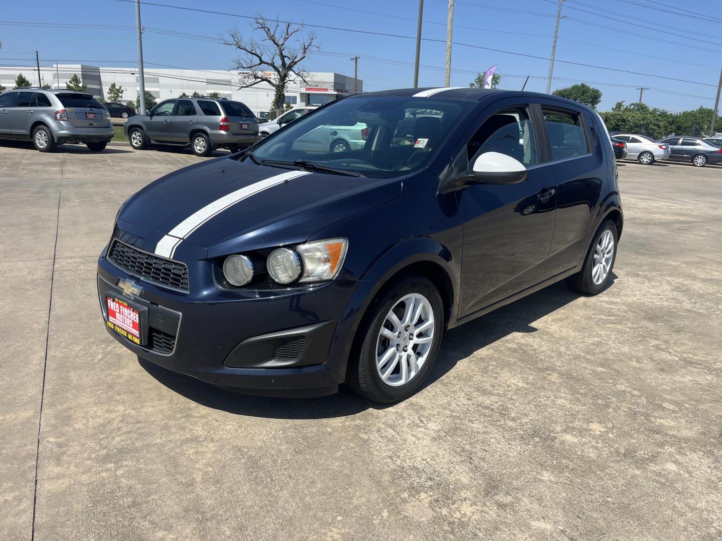 2016 blue /Black Chevrolet Sonic LT Auto 5-Door (1G1JC6SH1G4) with an 1.8L L4 DOHC 24V engine, 6A transmission, located at 14700 Tomball Parkway 249, Houston, TX, 77086, (281) 444-2200, 29.928619, -95.504074 - Photo#2