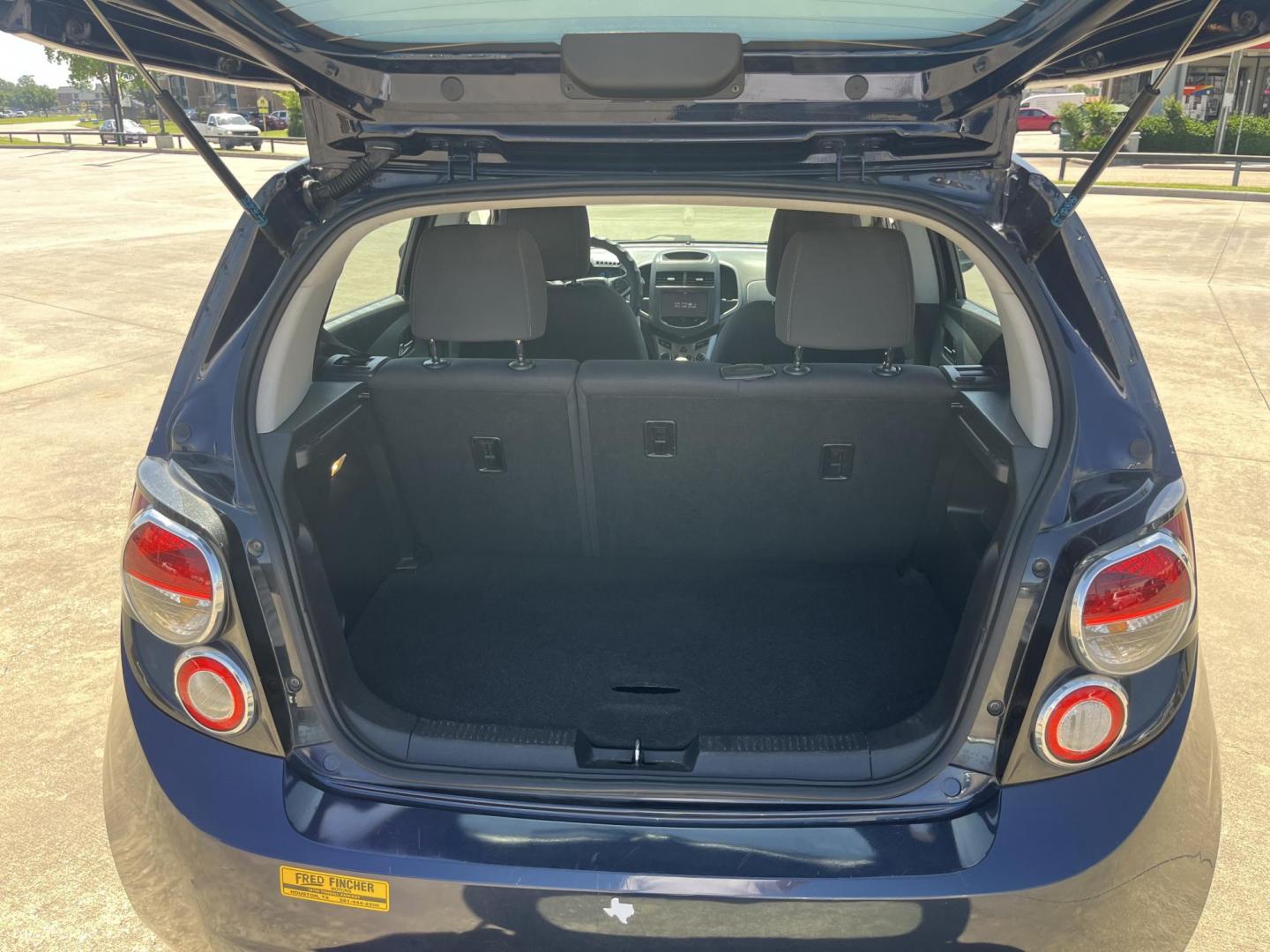 2016 blue /Black Chevrolet Sonic LT Auto 5-Door (1G1JC6SH1G4) with an 1.8L L4 DOHC 24V engine, 6A transmission, located at 14700 Tomball Parkway 249, Houston, TX, 77086, (281) 444-2200, 29.928619, -95.504074 - Photo#13