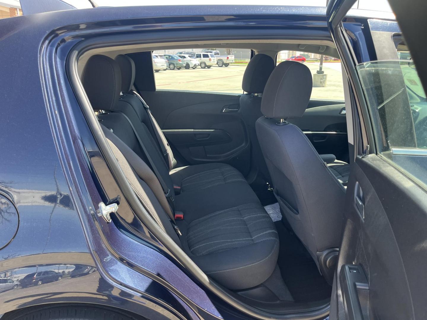 2016 blue /Black Chevrolet Sonic LT Auto 5-Door (1G1JC6SH1G4) with an 1.8L L4 DOHC 24V engine, 6A transmission, located at 14700 Tomball Parkway 249, Houston, TX, 77086, (281) 444-2200, 29.928619, -95.504074 - Photo#12