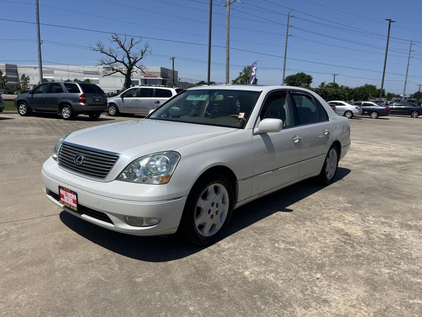 2003 white /Tan Lexus LS 430 Sedan (JTHBN30F530) with an 4.3L V8 DOHC 32V engine, 5-Speed Automatic Overdrive transmission, located at 14700 Tomball Parkway 249, Houston, TX, 77086, (281) 444-2200, 29.928619, -95.504074 - Photo#2