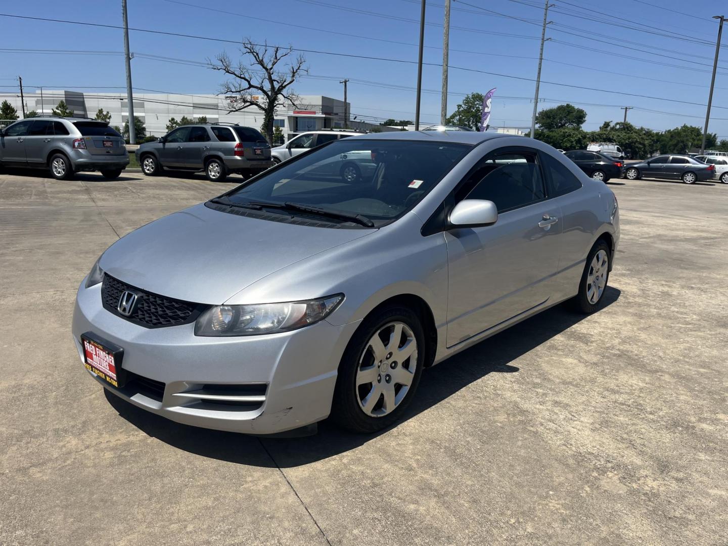 2011 silver /Gray Honda Civic LX Coupe 5-Speed AT (2HGFG1B68BH) with an 1.8L L4 SOHC 16V engine, 5-Speed Automatic transmission, located at 14700 Tomball Parkway 249, Houston, TX, 77086, (281) 444-2200, 29.928619, -95.504074 - Photo#2